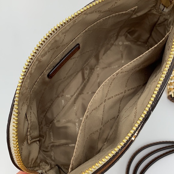 Michael Kors Medium Dome Xcross Xbody Bag
Color: Vanilla Multi - Picture 13 of 16